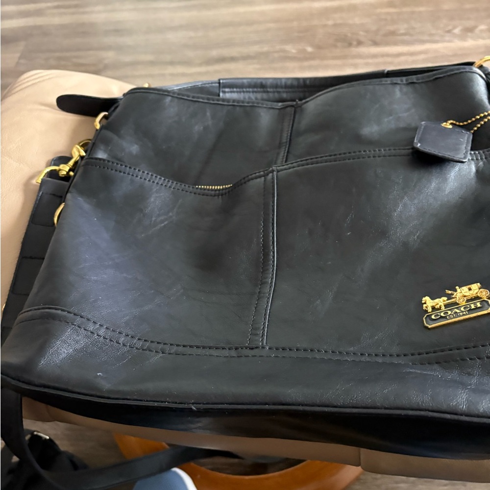 Coach Black Messenger Bag with Textured Leather and Gold Accents